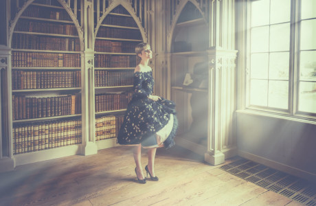 model in window with sun rays