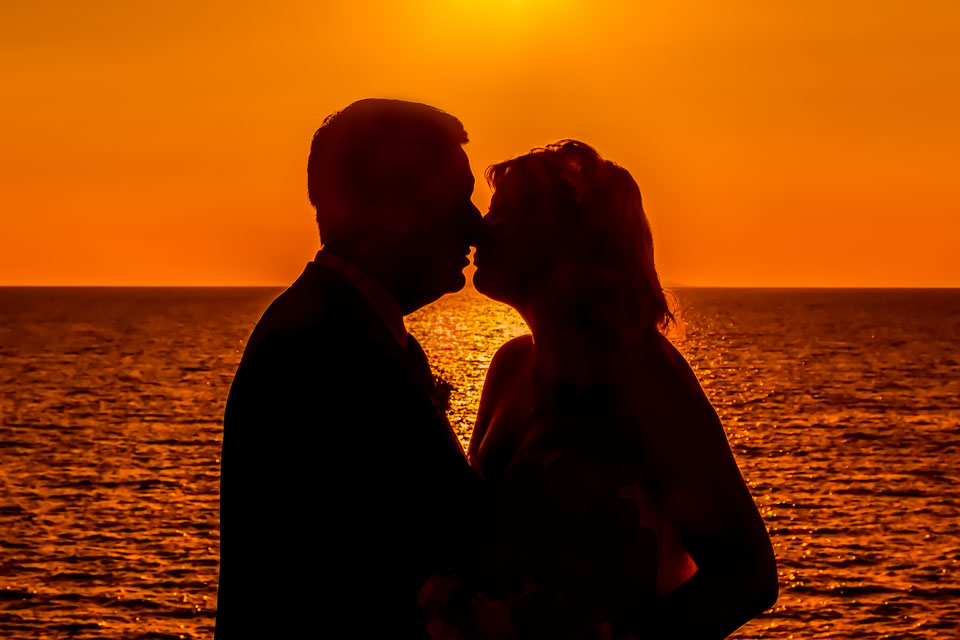 Wedding Photography FAQ's Sunset couple